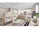 Open concept living room and kitchen with a modern aesthetic at 1012 S Holly Ave, Sanford, FL 32771