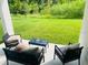 Covered patio with seating and a grill at 737 Trillium Ct, Debary, FL 32713