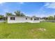 Spacious backyard with a view of the home at 354 Park Dr, Deland, FL 32724
