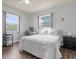 Bedroom with a striped bedspread and a workspace at 354 Park Dr, Deland, FL 32724