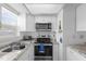 Well-equipped kitchen featuring stainless steel appliances at 354 Park Dr, Deland, FL 32724
