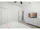 Comfortable bedroom with a queen-size bed and access to living area at 5229 Oakbourne Ave, Davenport, FL 33837