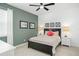 Cozy bedroom with a queen bed, nightstands, and soft color scheme at 5229 Oakbourne Ave, Davenport, FL 33837