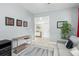 Bright and airy common area with a sofa and décor at 5229 Oakbourne Ave, Davenport, FL 33837