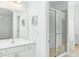 Clean bathroom with a walk-in shower and vanity at 5229 Oakbourne Ave, Davenport, FL 33837