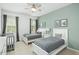 Charming bedroom with two twin beds, ample closet space and soft decor at 5229 Oakbourne Ave, Davenport, FL 33837