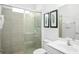 Clean bathroom with a walk-in shower and updated fixtures at 5229 Oakbourne Ave, Davenport, FL 33837