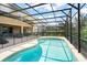 Inviting screened pool area with ample space for relaxation and entertainment at 5229 Oakbourne Ave, Davenport, FL 33837