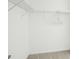 Large walk-in closet with wire shelving and hanging rods at 5229 Oakbourne Ave, Davenport, FL 33837