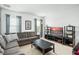 Relaxing Gathering room with comfortable seating and a large-screen TV at 5229 Oakbourne Ave, Davenport, FL 33837