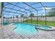 Screened pool and spa with lounge chairs at 10472 Petrillo Way, Winter Garden, FL 34787