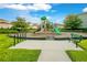 Community playground with playset, bench, and bike rack at 10472 Petrillo Way, Winter Garden, FL 34787