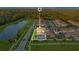 Aerial view of house with pool in a residential community at 10472 Petrillo Way, Winter Garden, FL 34787
