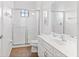 Clean bathroom with shower/tub combo and white vanity at 2654 Rosemont Cir, Davenport, FL 33837