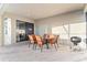 Outdoor patio with seating area and grill, perfect for entertaining at 2654 Rosemont Cir, Davenport, FL 33837