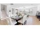Bright dining area with a large table and seating for six at 2654 Rosemont Cir, Davenport, FL 33837