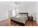 King-size bed, ceiling fan, and plenty of closet space at 2654 Rosemont Cir, Davenport, FL 33837
