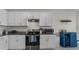 Modern kitchen with stainless steel appliances and granite countertops at 2716 Fieldbrooke Way, Edgewater, FL 32141