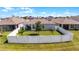Aerial view showcasing a community of homes with lush landscaping at 2716 Fieldbrooke Way, Edgewater, FL 32141