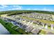 Community overview showcasing numerous homes and a waterfront view at 2716 Fieldbrooke Way, Edgewater, FL 32141