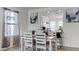 Charming dining room with a view into the kitchen and breakfast nook at 2716 Fieldbrooke Way, Edgewater, FL 32141