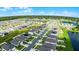 Aerial view of a large residential community with lakes at 2716 Fieldbrooke Way, Edgewater, FL 32141