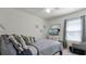 Spacious bedroom with a king-size bed and dresser at 2716 Fieldbrooke Way, Edgewater, FL 32141