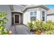 Welcoming front entrance with a walkway and well-maintained landscaping at 2716 Fieldbrooke Way, Edgewater, FL 32141