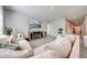 Open living room with comfortable seating and tile floors at 1475 Haines Dr, Winter Haven, FL 33881