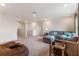 Second living area with sectional sofa and lots of natural light at 2864 Sanctuary Dr, Clermont, FL 34714