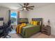Bedroom with gaming setup and large window at 2864 Sanctuary Dr, Clermont, FL 34714