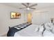 Bedroom with a ceiling fan and comfortable bedding at 2864 Sanctuary Dr, Clermont, FL 34714