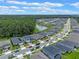 Property location view with pond and surrounding houses at 2864 Sanctuary Dr, Clermont, FL 34714