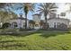 Community entrance with lush landscaping at 13905 Fairway Island Dr # 1022, Orlando, FL 32837