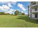 View of the expansive green space behind the property at 13905 Fairway Island Dr # 1022, Orlando, FL 32837