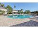 Community pool with brick pavers and gazebo at 13905 Fairway Island Dr # 1022, Orlando, FL 32837