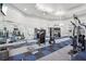 Well-equipped community gym featuring various cardio and strength training machines at 13905 Fairway Island Dr # 1022, Orlando, FL 32837