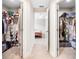 Hallway with two large closets and tile floors at 1302 Belmar Ter, Deltona, FL 32725