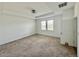 Bright and airy bedroom with neutral carpeting and two windows at 5013 Center Ct, St Cloud, FL 34772