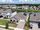 House with solar panels, a large backyard, and a lake view at 5013 Center Ct, St Cloud, FL 34772