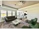 Living room with modern furniture and kitchen view at 5013 Center Ct, St Cloud, FL 34772
