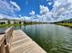 Wooden dock extending into the lake at 5013 Center Ct, St Cloud, FL 34772