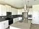 Modern kitchen featuring stainless steel appliances and ample counter space at 5013 Center Ct, St Cloud, FL 34772