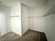 Large walk-in closet with ample shelving and hanging space at 5013 Center Ct, St Cloud, FL 34772