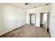 Simple bedroom with neutral carpeting and a double door closet at 5013 Center Ct, St Cloud, FL 34772