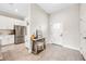 Bright entryway with tile flooring and view into kitchen at 1302 Belmar Ter, Deltona, FL 32725