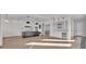 Modern kitchen with island, stainless steel appliances, and white cabinetry at 1917 S Lakemont Ave, Winter Park, FL 32792