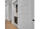 Walk-in pantry with ample shelving and modern dark cabinetry at 1917 S Lakemont Ave, Winter Park, FL 32792