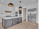 Modern kitchen with stainless steel appliances and a large island at 1917 S Lakemont Ave, Winter Park, FL 32792