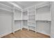 Spacious walk-in closet with ample shelving and hanging space at 1917 S Lakemont Ave, Winter Park, FL 32792